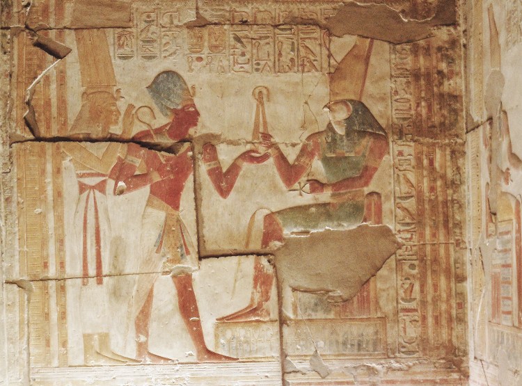 Seti I making offerings to Horus