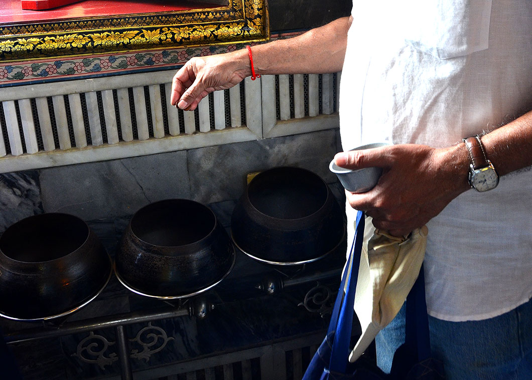 Coin offering - Wat Pho, Bangkok