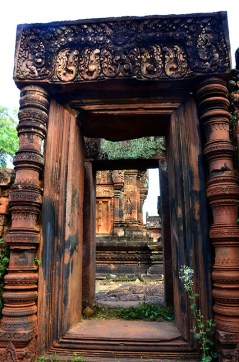 View through a doorwayAnimal headed Dwarapalakas (guardians), Banteay Srei - Siem Reap, Cambodia