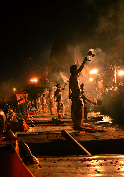 Ganga Aarti, Varanasi: Priests raise incense burners in sequence.