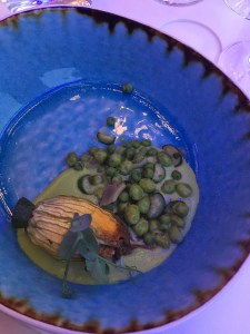 Dinner in the Tram restaurant: courgette flowers stuffed with king crab, green pea mousse, white sesame emulsion