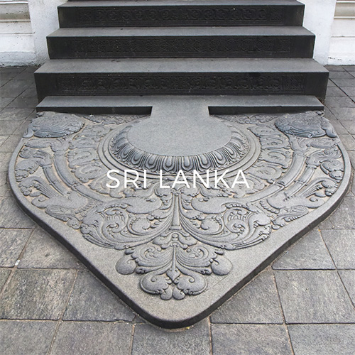 Carved Moonstone threshold slab in the temple of the tooth relic, Kandy. Image link to Sri Lanka Guide