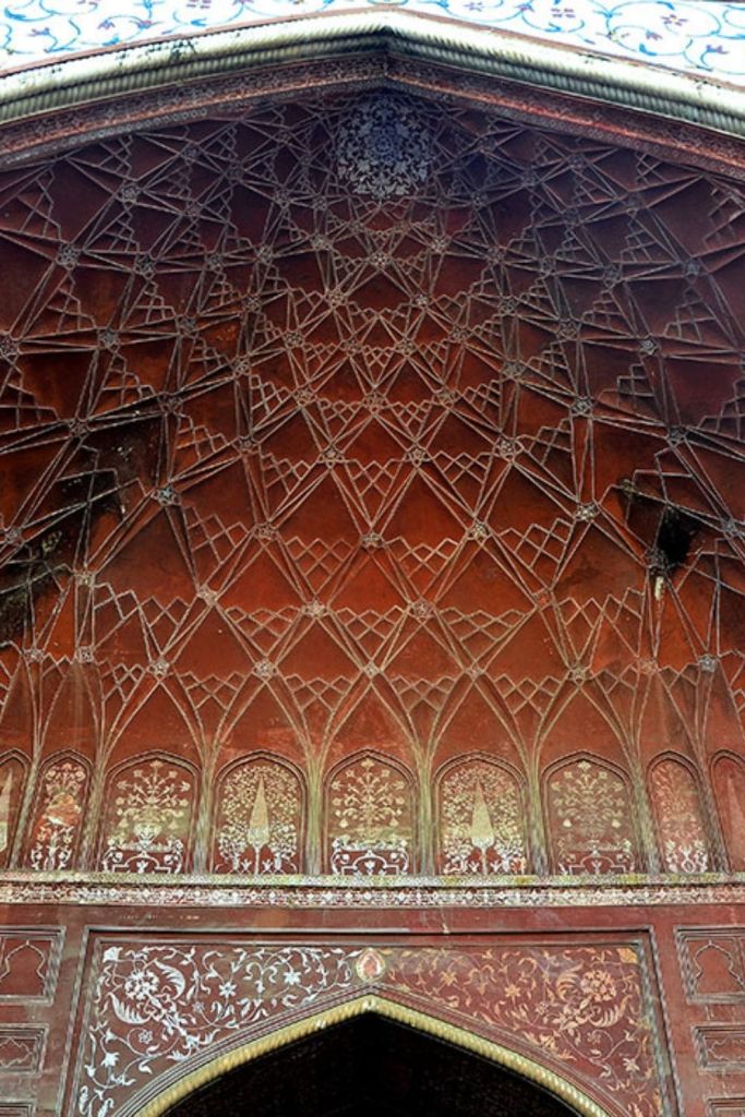 Painted flower motifs and honey comb ceiling detail  in the Mehman Khana
