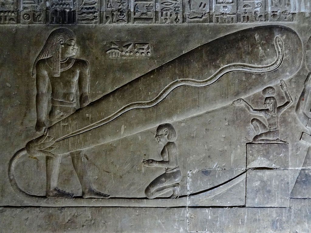 The Dendera Light - Strange relief that resembles a light bulb is actually a djed pillar and a lotus flower spawning a snake. Symbolic of stability and fertility. 