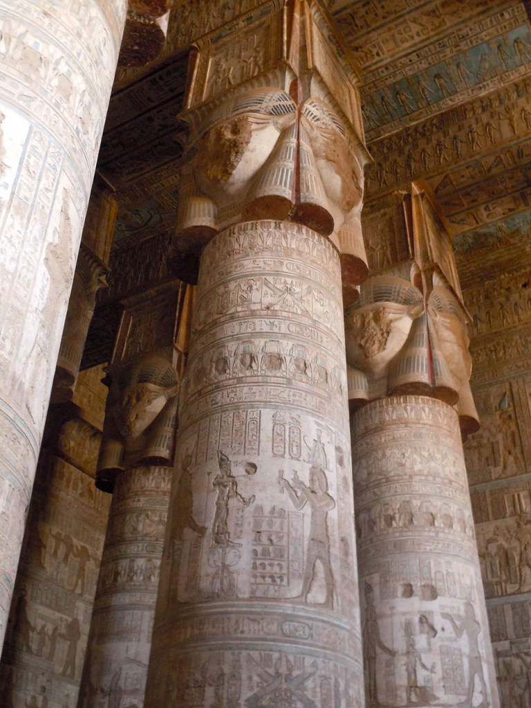 The hypostyle hall with columns topped with Hathor face capitals.