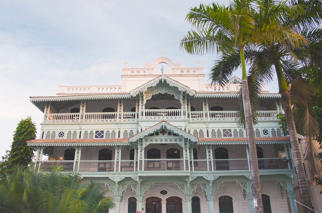 Pale green filigreed facade of the Old Dispensary - Stone Town Travel Guide
